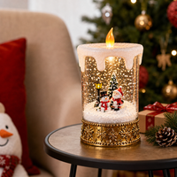 Lumânare Decorativă Premium de Crăciun cu Moș Crăciun și Om de Zăpadă – Iluminare Caldă și Efect de Ninsoare, 12 × 12 × 28,5 cm - 1