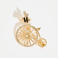 Brosa metalica aurie - albinuta pe bicicleta cu detalii argintii - 1