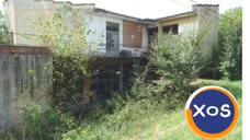 Proprietate imobiliara in sat Ghelmegioaia