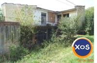Proprietate imobiliara in sat Ghelmegioaia - 1