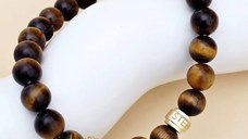 Bratara pietre semipretioase Ochi de tigru de 8 mm - doi cilindrii din Argint 925 placat cu Aur Galben - Snur elastic