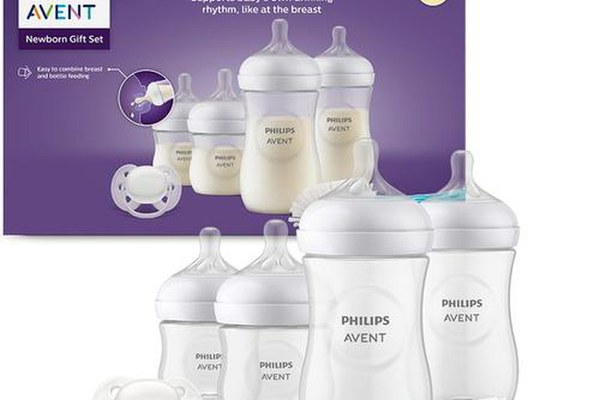 Set nou-nascut Philips Avent Natural Response SCD838/11, tetina care functioneaza ca sanul mamei, tetina fara scurgeri, 4 biberoane, suzeta ultra-soft 0-6 luni, perie pentru biberon