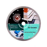 Disc Diamantat pentru Ceramica, Tigla, Piatra, Caramida, Plasa tip "W", Taiere Umeda si Uscata, D 230 mm, Dim. segmentului: 10 mm, Grosime 2 mm - 1