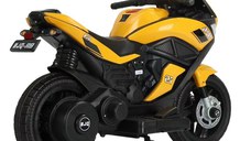Motocicleta electrica pentru copii Nichiduta Storm Yellow cu 2 motoare x 38w,scaun confortabil din piele ecologica,roti ajutatoare,oglinzi retrovizoare,lumini LED,muzica,pornire la buton,suport picioare,manere ergonomice
