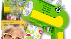 Pistol pentru baloane de sapun cu lumini Green Dino